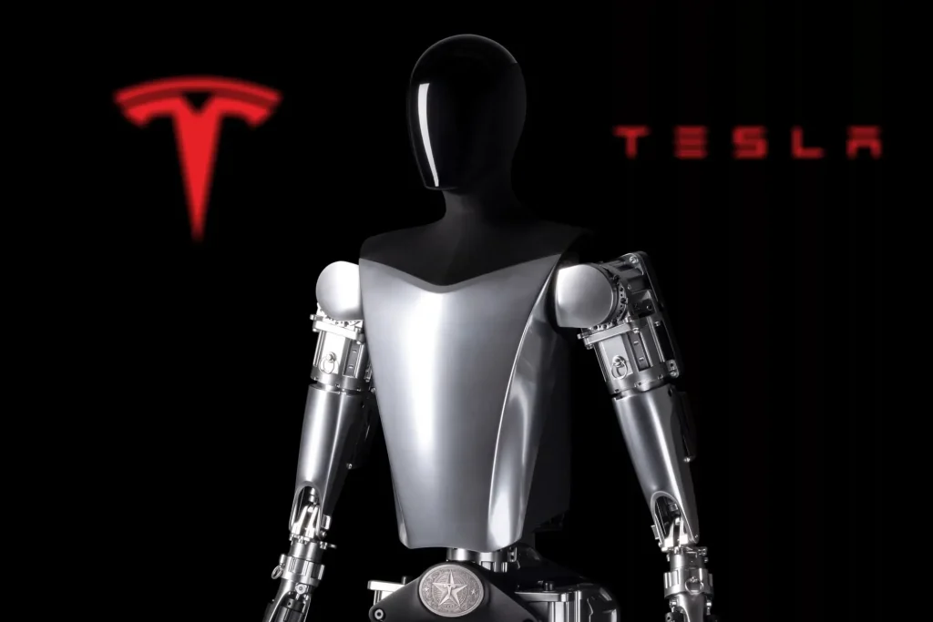 Teslas 2022 Optimus robot prototype is seen in front of the company logo